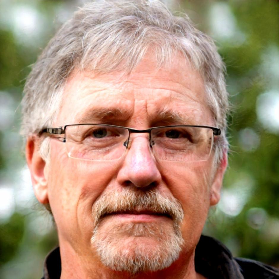 Torsten Viklund reviewing financial planning materials