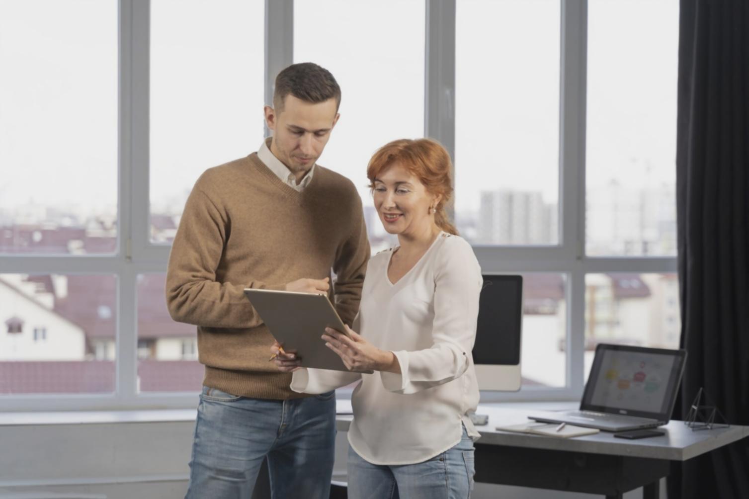 Digital learning setup with multiple screens displaying financial charts and educational content